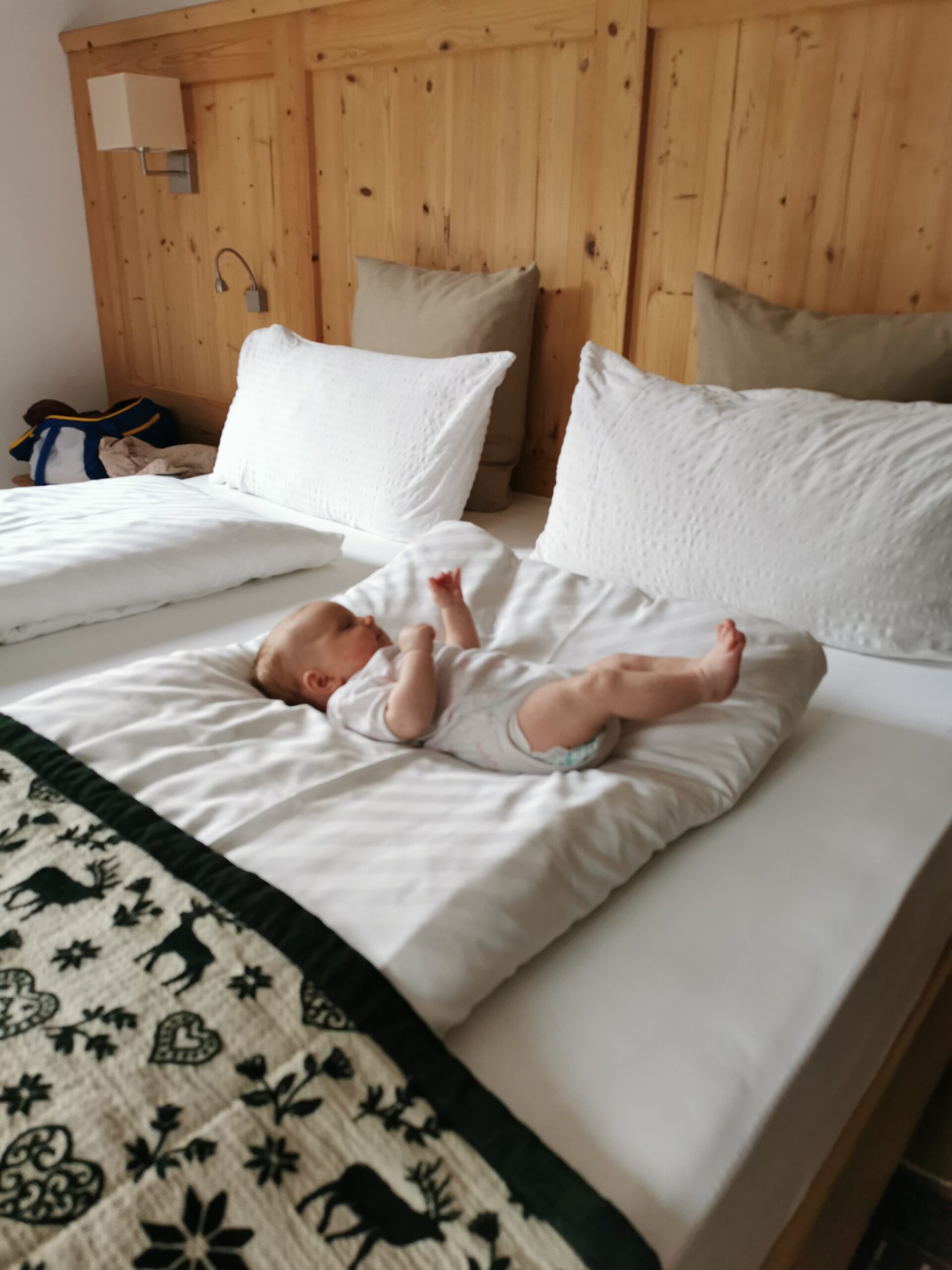 Baby on bed Rio Stava